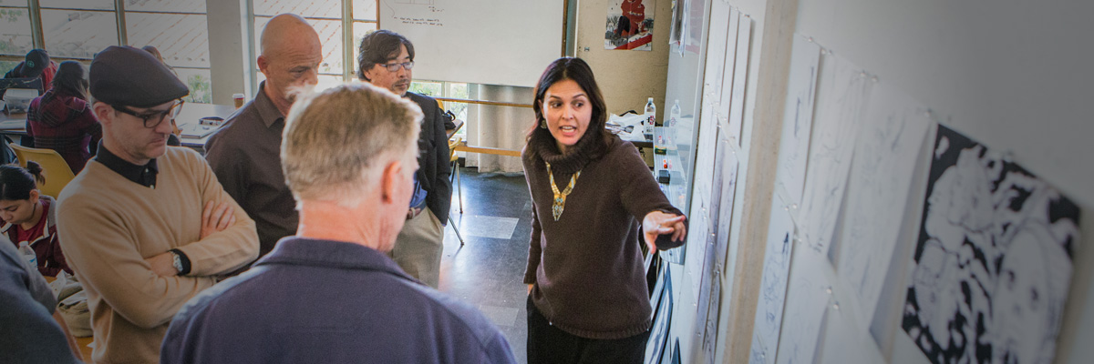 Professor describing art to onlookers