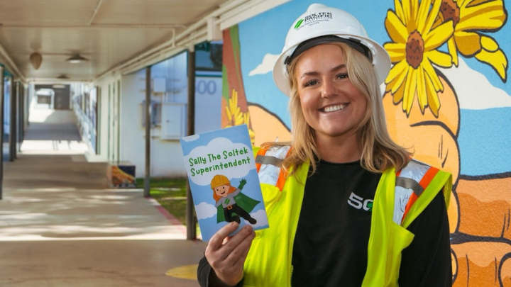 Emma Löfblad poses with her children’s book.