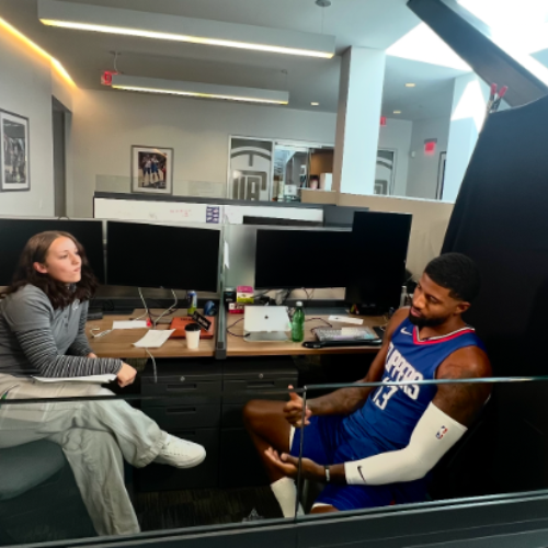 Lindsy Peterson interviews a Los Angeles Clippers player during a one-on-one media conversation.