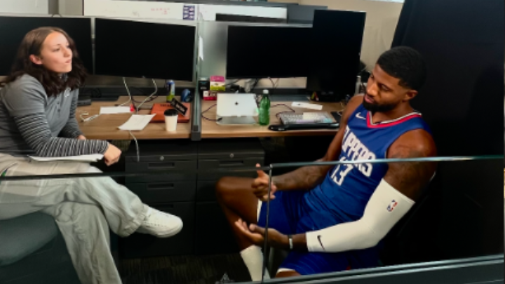 Lindsy Peterson interviews a Los Angeles Clippers player during a one-on-one media conversation.