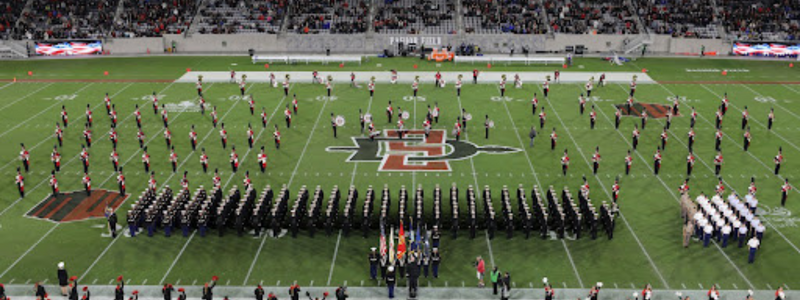 The joint ROTC formation awaits the playing of the National Anthem.