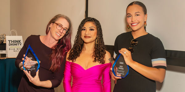 SDSU’s Megan Welsh Carrol (left) and Judith Vaughs, Public Affairs Manager at Planned Parenthood of the Pacific Southwest, (right) receive Think Dignity’s 2023 Dignity Defender of the Year award, presented by Mitchelle Woodson, Executive Director and Managing Attorney of Think Dignity (center).