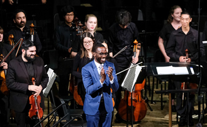 Guest Artist and Composer Joel Thompson with the SDSU Symphony at an Arts Alive Discovery Series concert event in 2019
