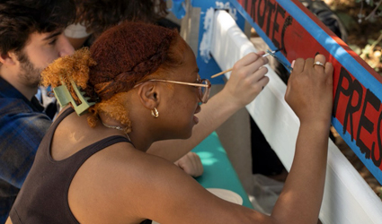 Students paint the Art Benches, adding functional and compelling art to SDSU’s campus. 
