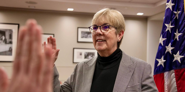 Jill Nash being sworn into the board. 