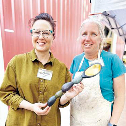 Kimberly Winkle, left, director of the School of Art, Craft and Design at Tech, collaborates on an artistic piece with Karen Ernst of Edinboro, Pennsylvania, at the recent Frogwood Collaboration in Oregon.