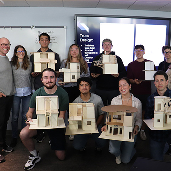 Students in James Brown and Dr. Gloria Faraone's Arts Alive collaborative course pose with their interdisciplinary engineering/design projects.