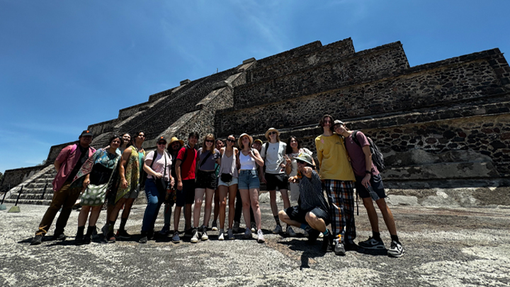 photo of SDSU Chamber Choir in front of historical pyramid