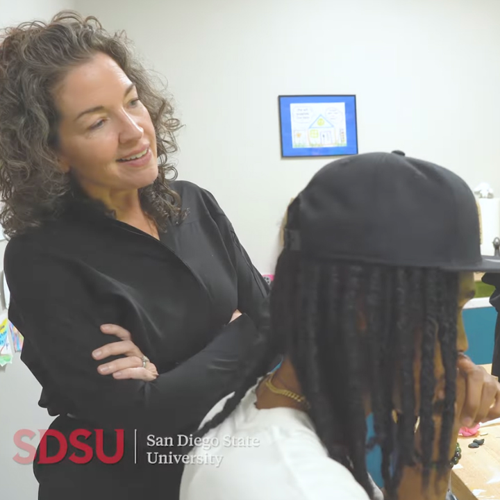 photo of Mary Posatko working with animation student