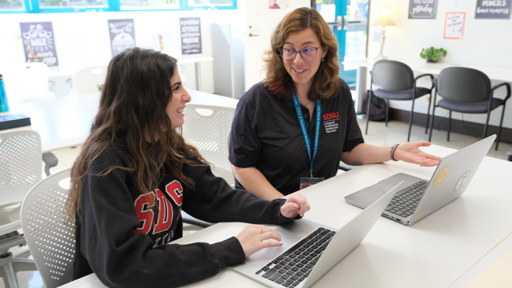 photo of Rebecca Tedesco, PARC director and learning coach, working with a student in the PARC