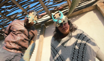 Artist Collective Xingaderas seen here wearing papier-mâché masks similar to those that will be constructed in their SDSU workshop