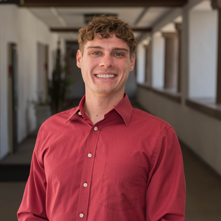 headshot of Dustin Adkins