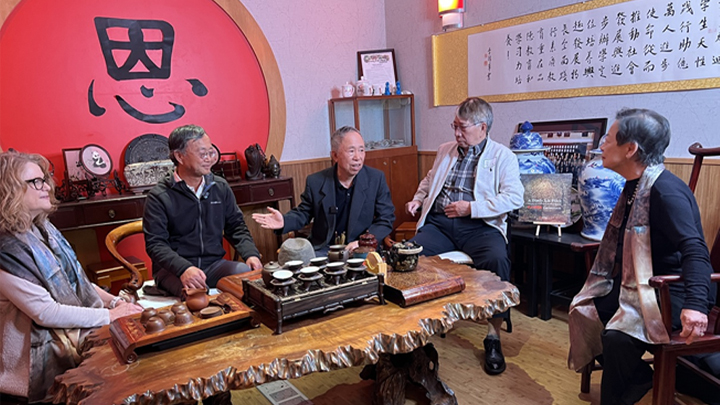 photo of Mr. Yu with PSFA Dean Janis McKay and guests
