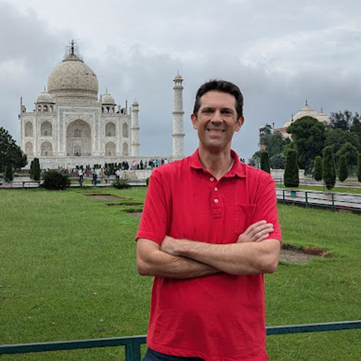Dr. Northup stands in front of the Taj Mahal.