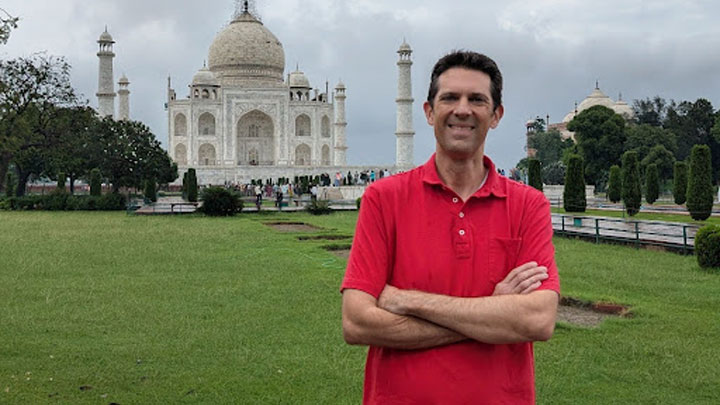 Dr. Northup stands in front of the Taj Mahal.
