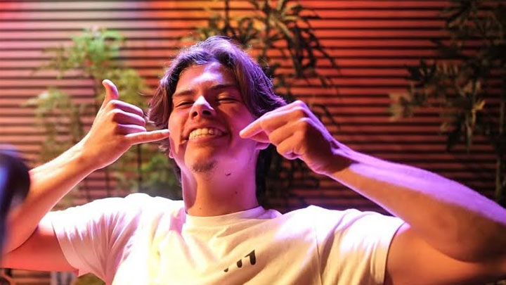 Cole Carillo saying “YG” in American Sign Language. Courtesy of the Daily Aztec.