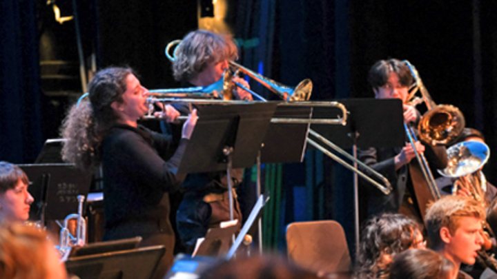 Kalya Aponte playing the trombone with the SDSU Wind Symphony at the Balboa Theatre in Nov. 2023. Photo credit Ken Jacques